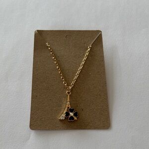 Bright Golden Plated crystal Eiffel Tower black Four leaf clover necklace.